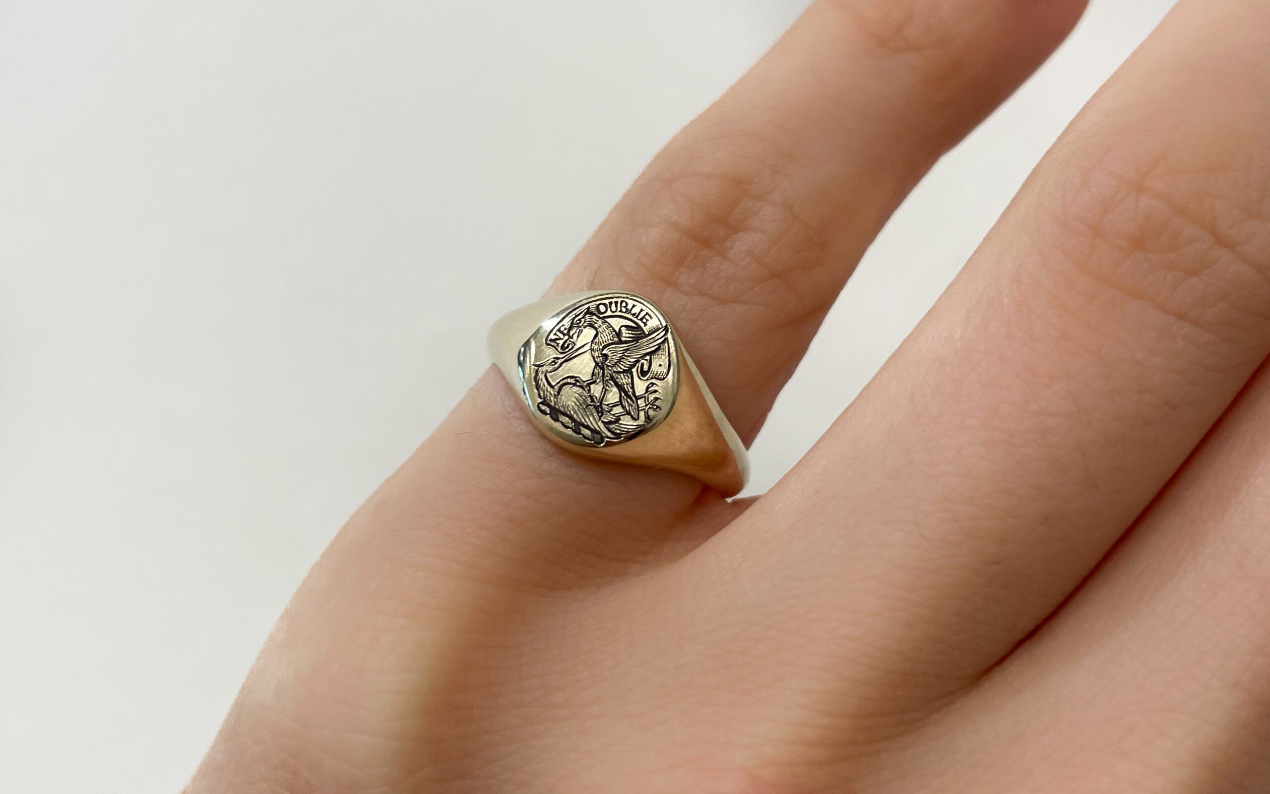 Crest engraved signet ring