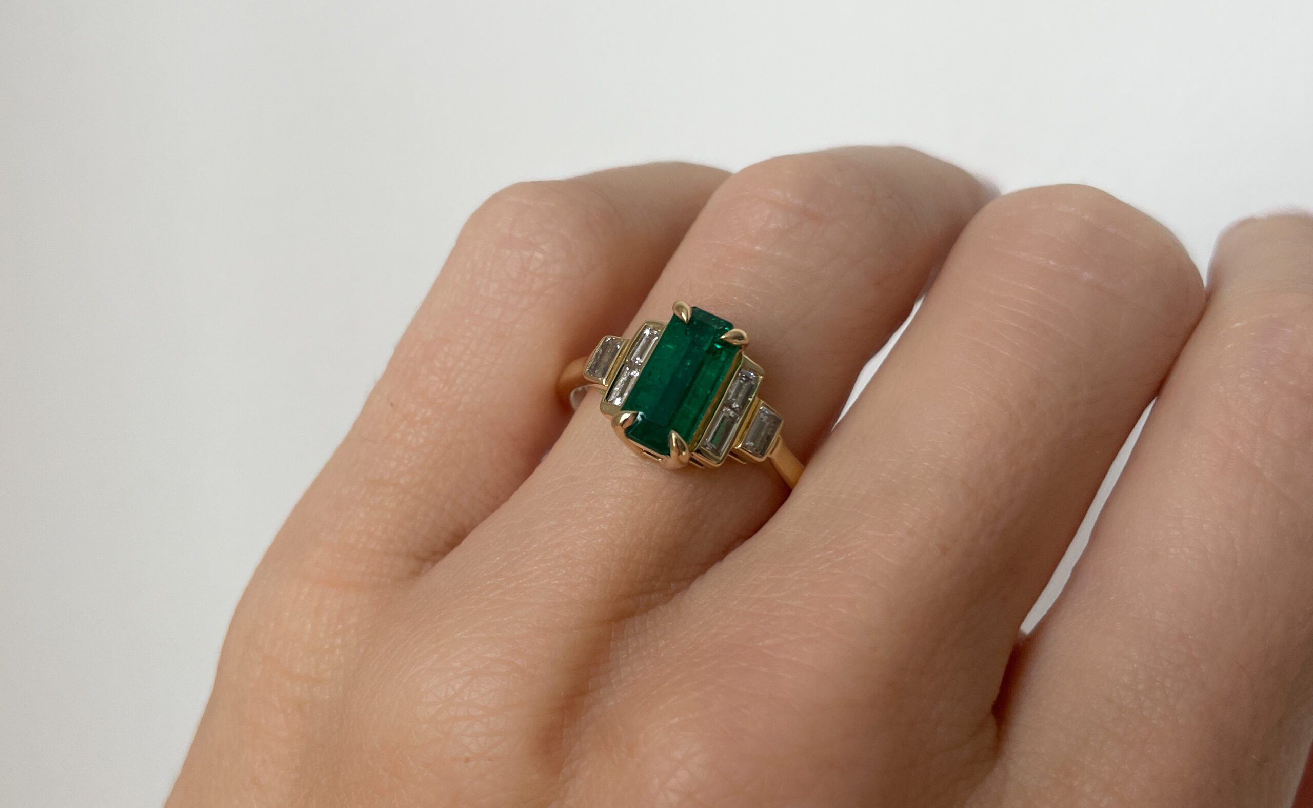 EMERALD CUT COLOMBIAN EMERALD AND DIAMOND ENGAGEMENT RING