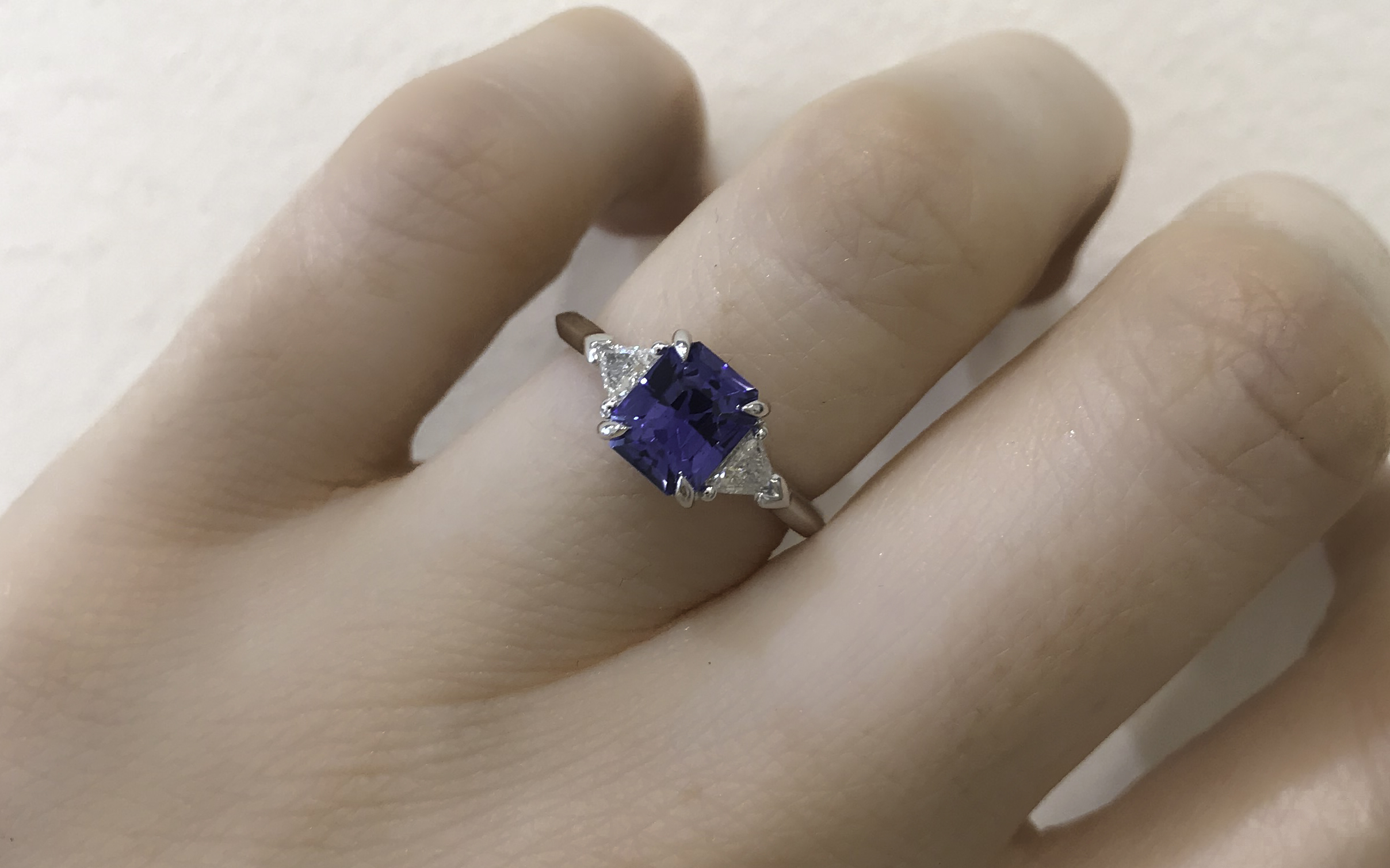 EMERALD-CUT BLUE CEYLON SAPPHIRE AND DIAMOND ENGAGEMENT RING
