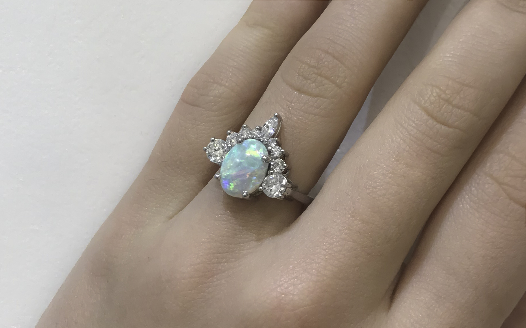 White opal and diamond engagement ring